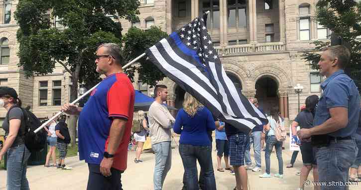 Pro-police group and those protesting law enforcement rallied in downtown Salt Lake City