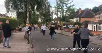 Watch: Neighbours take to Solihull street in summer solstice conga
