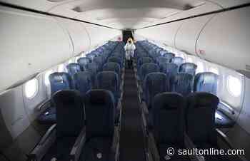 Ensure the tray table is up and your mask on: air travel in the era of COVID-19