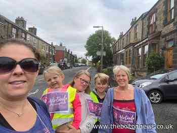 Residents walk 10,000 steps in pyjamas for Bolton Hospice