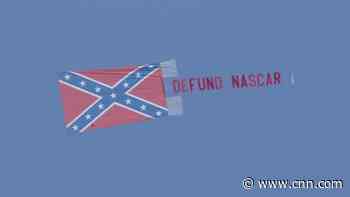 Confederate flag with 'Defund NASCAR' banner flies over Talladega