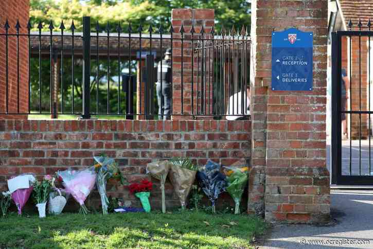 English town mourns victims of suspected terror attack
