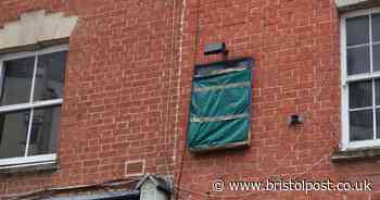 Old sign at long-closed pub covered up - this is why