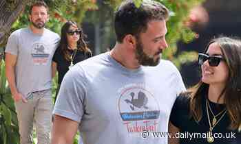 Ben Affleck and girlfriend Ana de Armas gaze at each other as they take actress' dog for a walk