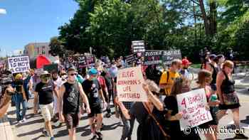 Hundreds descend on downtown Ottawa in support of Justice for Abdirahman march - CBC.ca