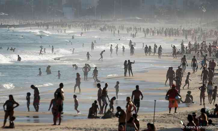 Brazilians flock to beach as WHO says country undercounting coronavirus surge
