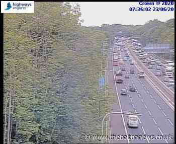 Traffic on M60 due to overturned lorry