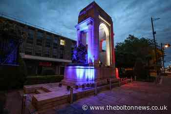 Town hall and war memorial turn red, white and blue for armed forces