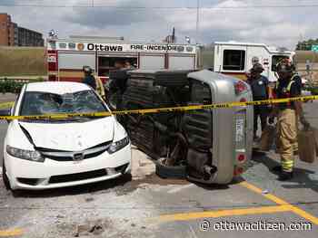 Firefighters peel roof from car to free victims in parking lot crash