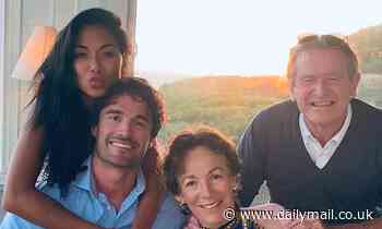 Thom Evans introduces Nicole Scherzinger to his parents as the couple fly to their home in Portugal