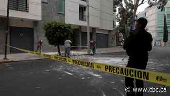 Strong quake hits southern Mexico, killing at least 2 people and triggering tsunami