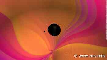 Gravitational waves reveal merger between black hole and mystery object