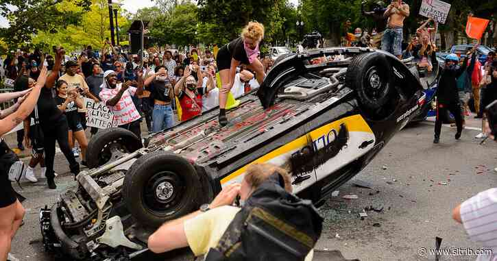 More people charged in the flipping and burning of Salt Lake City police car during protest