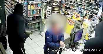 Terrifying armed robbers raid Nisa and hold gun to worker's head