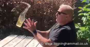 Watch - pub landlord's wife chucks pint at him in 'social distancing' demo