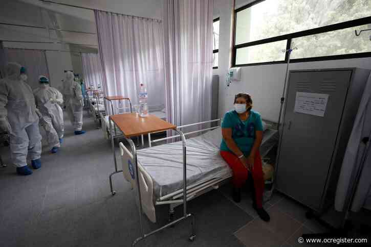 Some states break virus records as US caseload grows anew