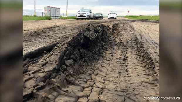 Pothole on "Highway to Hell" swallows Calgary car