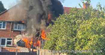 Huge flames and smoke plumes as conservatory destroyed in house blaze
