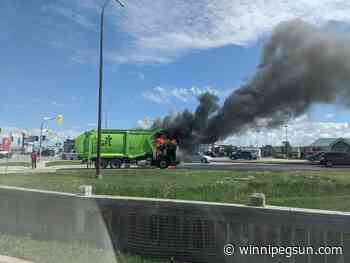 Recycling truck fire blocks traffic on busy route - Winnipeg Sun