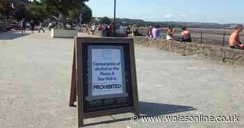 Warning signs put up in Mumbles after groups gather with their takeaway drinks
