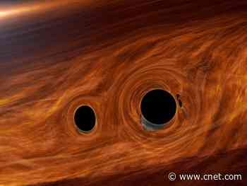 Invisible collision of monstrous black holes may have been seen for the first time     - CNET