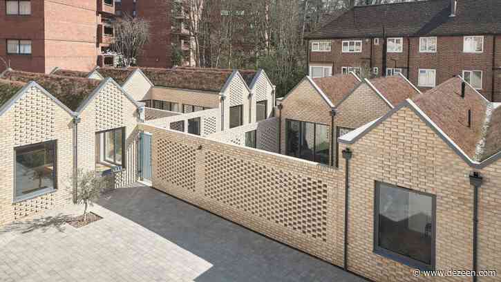 KennedyTwaddle inserts pitched-roofed houses with private courtyards into former timber yard