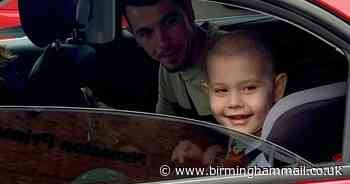 Brave boy reunited with classmates on return to UK after beating cancer