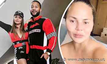 Chrissy Teigen zips into racy pit girl outfit after revealing results of breast surgery