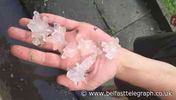 Large hailstones fall in northern England as thunderstorms sweep across UK