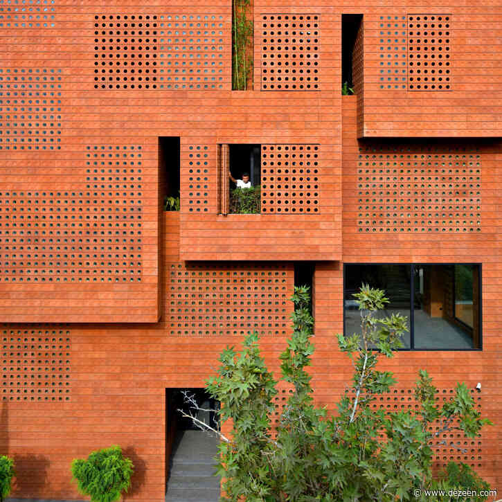 Hooba Design Group wraps Tehran office in glass-punctuated bricks