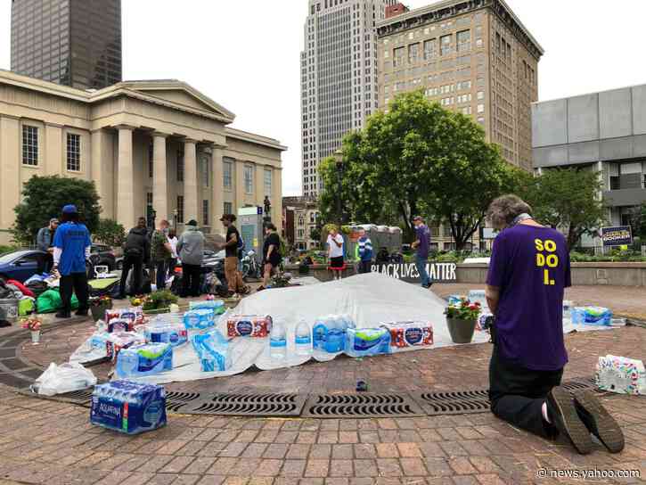 Suspect in killing at Louisville protest in custody