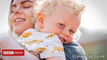 Nurse hugs two-year-old son after 11 weeks apart