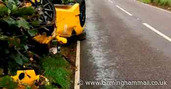 Yellow Ferrari supercar worth £250k crashes and flips on its roof