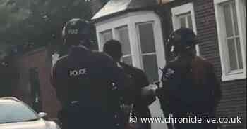 Four men arrested at gunpoint by armed officers released without charge