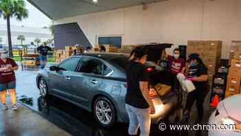Houston event center hosts food drive for families affected by COVID-19 - Chron