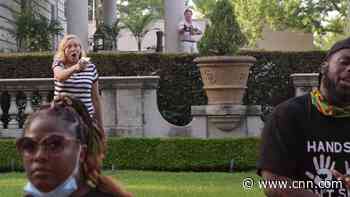 St. Louis couple pulls firearms on protesters cutting through their private street