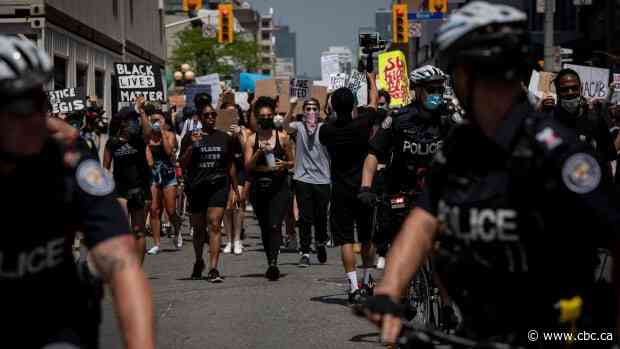 Cut Toronto police funding, or reform the force? Toronto council debates future of policing - CBC.ca