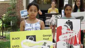 Grade 6 students in Toronto made posters about anti-Black racism. Someone vandalized them.