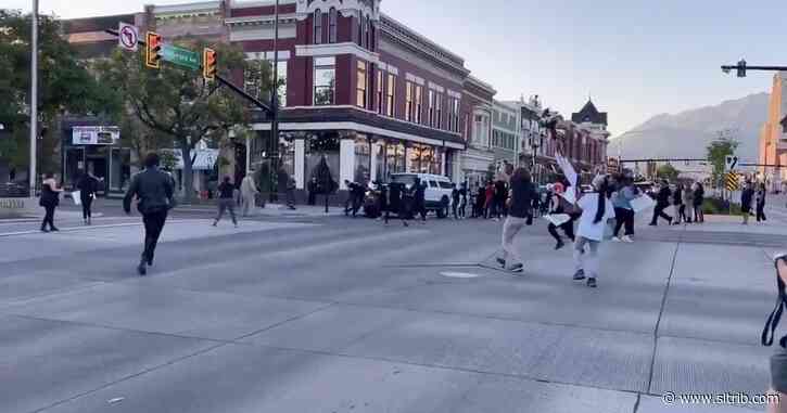 Police arrest two people after shooting of man who drove through crowd of protesters in Provo