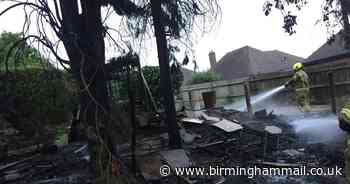Garden bonfire spreads to neighbour's property destroying fence and trees