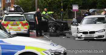 Woman and children injured after police chase ends in crash on major city road