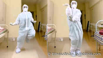 Covid-19 pandemic: Doctor shakes leg in healthcare centre despite wearing PPE kit