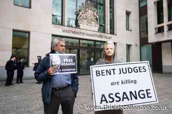 Assange told to attend court hearing after 'torture' claims
