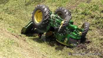 Houston worker rescued after tractor rolls on top of him