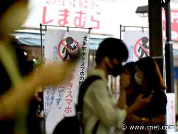 Heads up: Japanese city bans using smartphones while walking, report says     - CNET