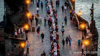 Prague celebrates end of coronavirus lockdown with mass dinner party at 1,600-foot table - CNN