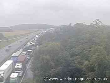 6 mile queues after car flips and forces M62 to close