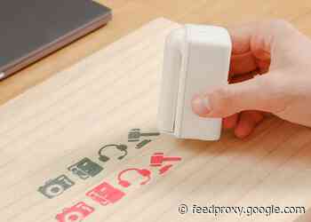 PrintPods handheld printer prints on any surface