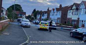 Police incident in Chorlton as officers seal off street