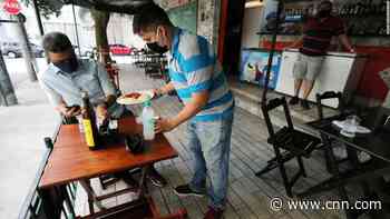 'Sending the population to the slaughterhouse': Restaurants and bars open in Rio, as experts warn worst is yet to come